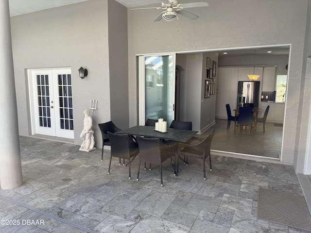 1811 N Central Ave, Flagler Beach, FL 32136 - view of patio / terrace with outdoor dining area, a ceiling fan, and french doors