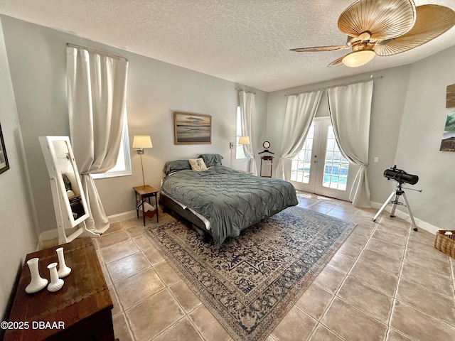 1811 N Central Ave, Flagler Beach, FL 32136 - bedroom with access to outside, a textured ceiling, light tile patterned floors, and french doors