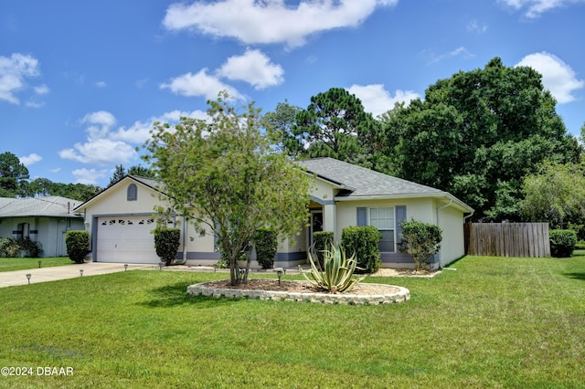 single story home featuring a garage and a front yard