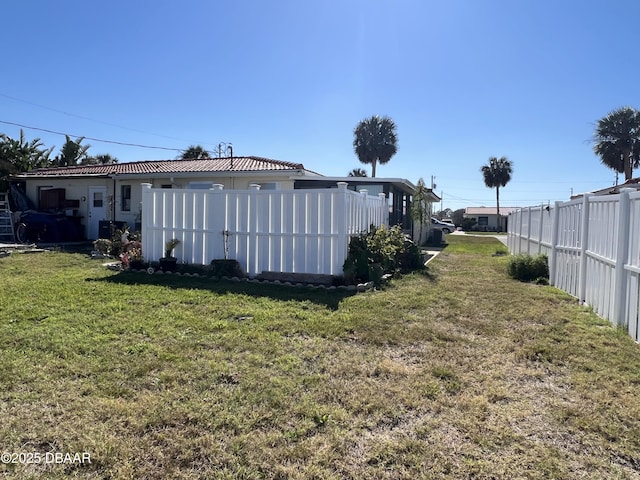 view of yard with fence