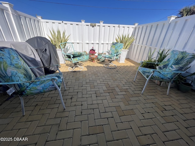 view of patio featuring a fenced backyard