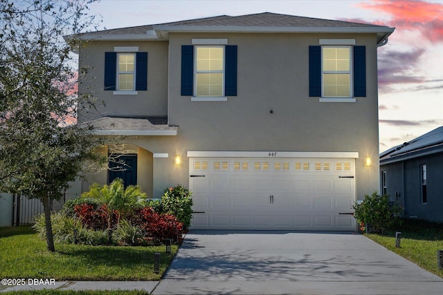 view of front of property featuring a garage