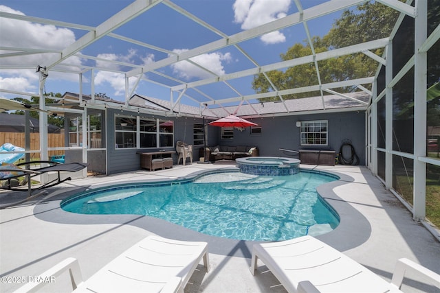 1052 Tompkins Dr, Port Orange, FL 32129 - view of pool featuring a patio, outdoor lounge area, glass enclosure, and a pool with connected hot tub