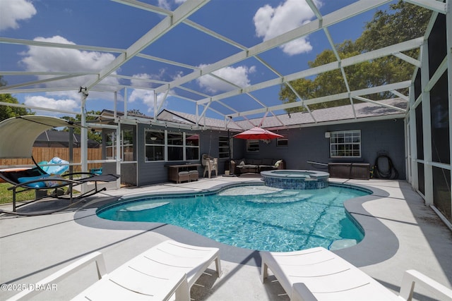 1052 Tompkins Dr, Port Orange, FL 32129 - view of pool with a patio area, an outdoor hangout area, a pool with connected hot tub, and glass enclosure
