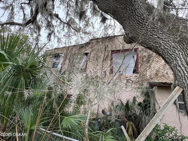 view of home's exterior with stucco siding