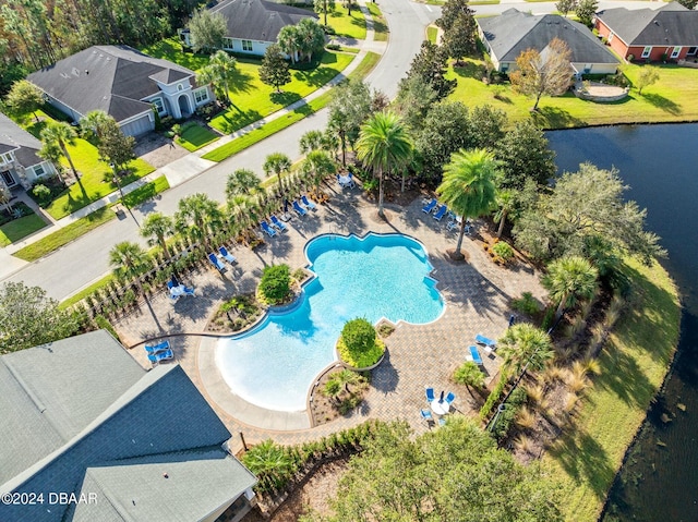 bird's eye view with a water view