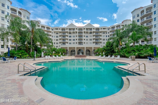 1 John Anderson Dr Unit 103, Ormond Beach, FL 32176 - community pool featuring a patio