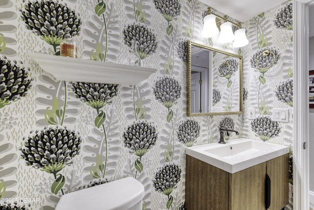 1 John Anderson Dr Unit 103, Ormond Beach, FL 32176 - bathroom with wallpapered walls and vanity