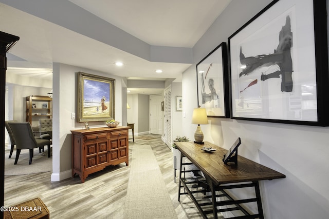 1 John Anderson Dr Unit 103, Ormond Beach, FL 32176 - hall featuring light wood-style floors and recessed lighting