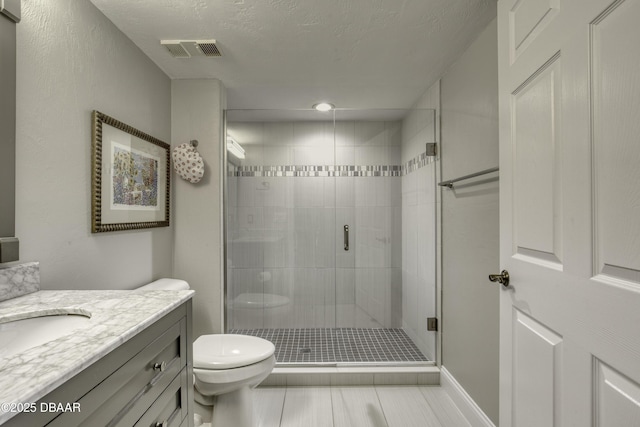 1 John Anderson Dr Unit 103, Ormond Beach, FL 32176 - bathroom with vanity, a shower stall, and tile patterned flooring