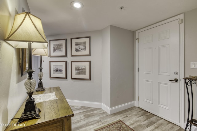 1 John Anderson Dr Unit 103, Ormond Beach, FL 32176 - foyer with light wood-style floors and recessed lighting
