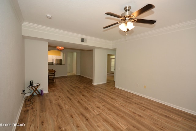 unfurnished living room with crown molding, wood-type flooring, and ceiling fan