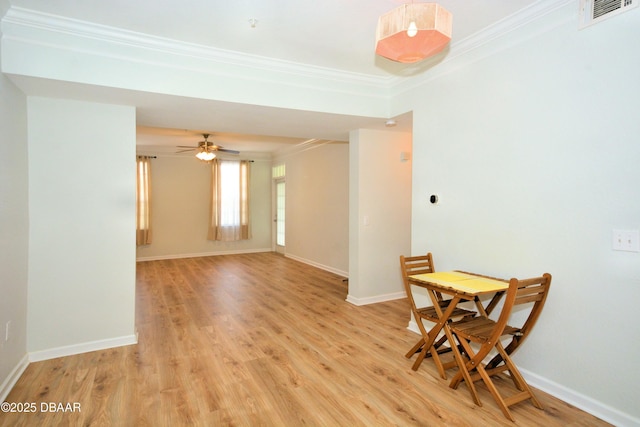 unfurnished room with crown molding and light hardwood / wood-style flooring