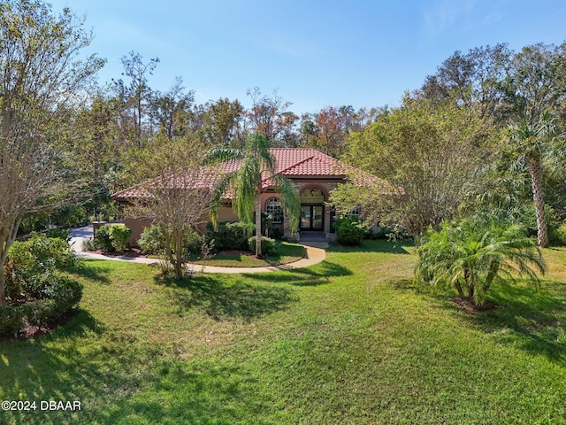 exterior space featuring a front lawn