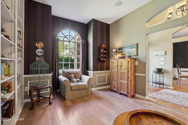 sitting room featuring hardwood / wood-style flooring