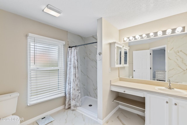 full bathroom with baseboards, toilet, marble finish floor, vanity, and a shower stall