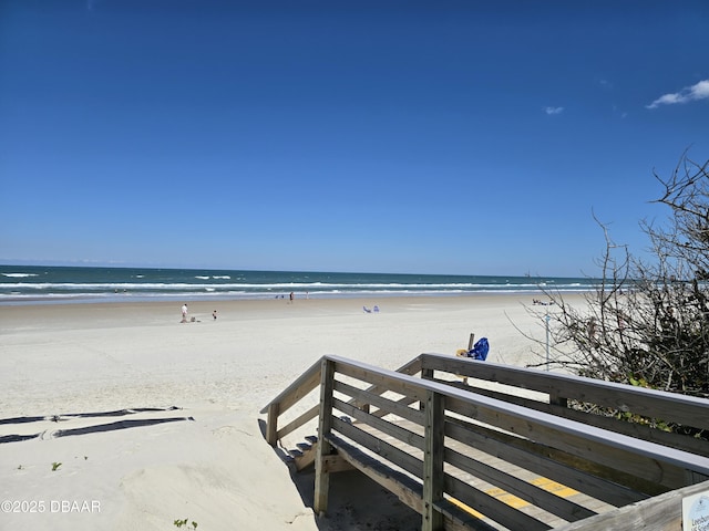 property view of water featuring a beach view