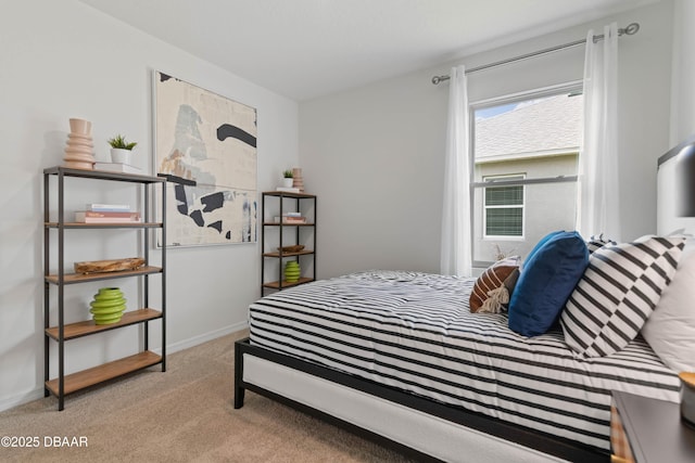 bedroom with light carpet