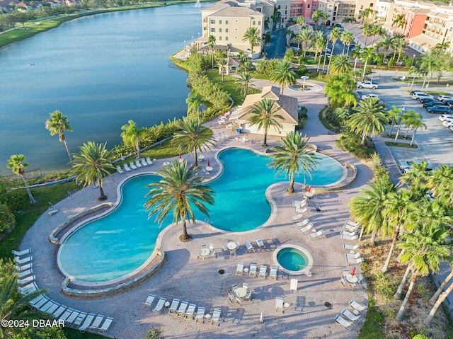 drone / aerial view featuring a water view