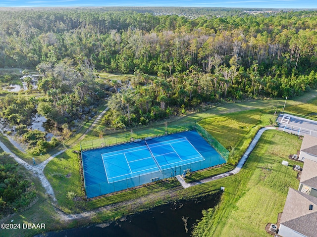 drone / aerial view with a view of trees