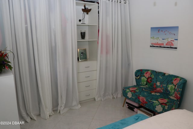 bedroom featuring light tile patterned floors