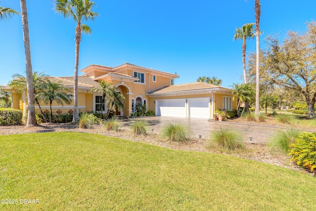 20 Promenade At Lionspaw, Daytona Beach, FL 32124 - mediterranean / spanish-style house with a tiled roof, an attached garage, driveway, and stucco siding