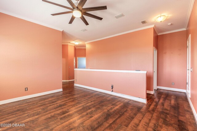20 Promenade At Lionspaw, Daytona Beach, FL 32124 - spare room featuring visible vents, ornamental molding, dark wood-style floors, baseboards, and ceiling fan