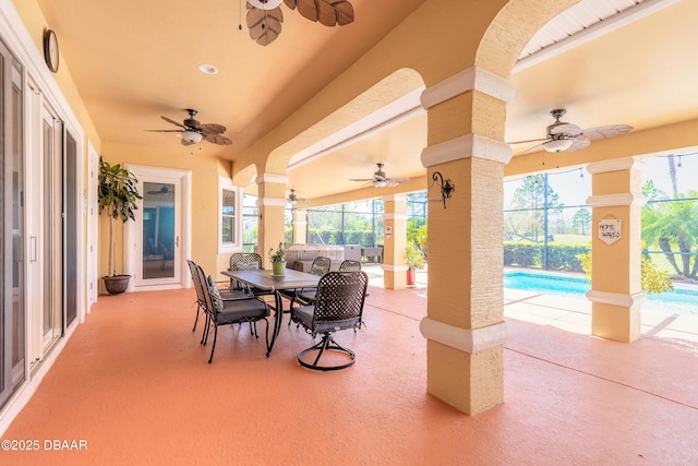 20 Promenade At Lionspaw, Daytona Beach, FL 32124 - view of patio featuring an outdoor pool, glass enclosure, and ceiling fan