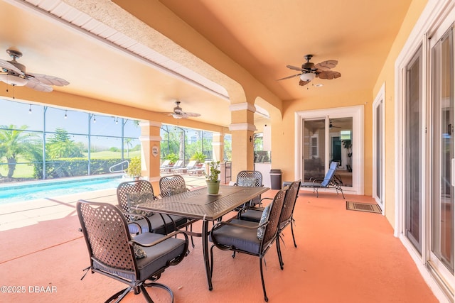 20 Promenade At Lionspaw, Daytona Beach, FL 32124 - view of patio with an outdoor pool, glass enclosure, and a ceiling fan