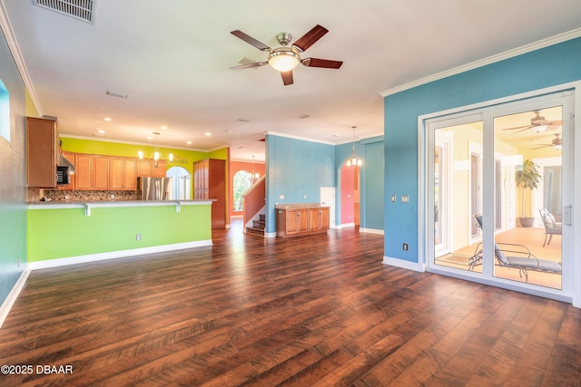 20 Promenade At Lionspaw, Daytona Beach, FL 32124 - unfurnished living room with visible vents, baseboards, dark wood finished floors, and ceiling fan with notable chandelier