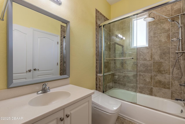 20 Promenade At Lionspaw, Daytona Beach, FL 32124 - bathroom with toilet, vanity, and shower / bath combination with glass door