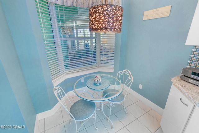 dining room featuring light tile patterned floors