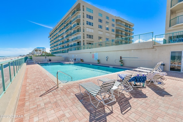 view of pool with a patio area