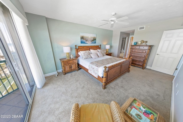 carpeted bedroom with ceiling fan and access to exterior