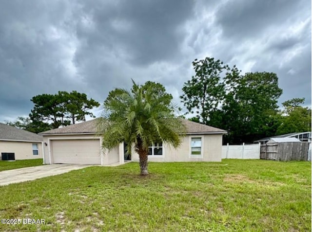 1362 Comerwood Dr, Deltona, FL 32738 - view of front of house with concrete driveway, a garage, and stucco siding