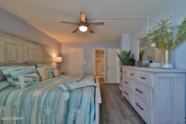 bedroom featuring hardwood / wood-style floors, ceiling fan, and ensuite bathroom