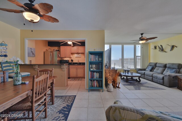 living room featuring light tile patterned flooring and sink