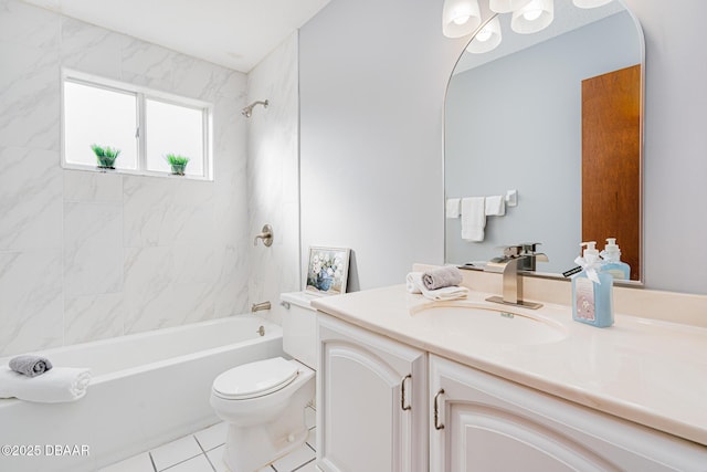 full bathroom with toilet, vanity, tile patterned floors, and tiled shower / bath