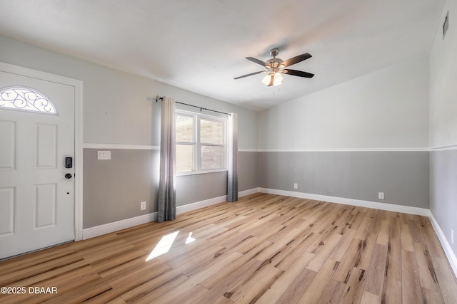 foyer featuring light wood-type flooring and ceiling fan