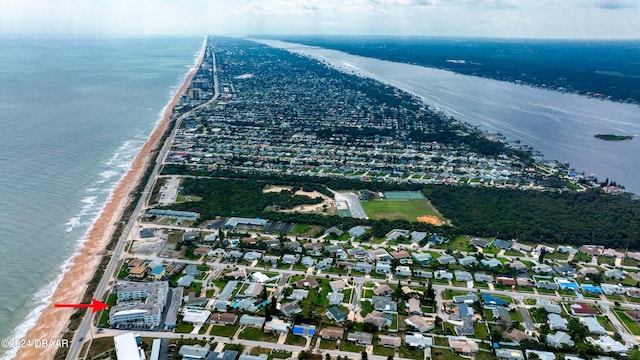 bird's eye view with a beach view and a water view