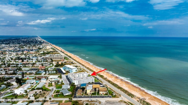 aerial view with a view of the beach and a water view