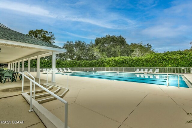 view of pool featuring a patio