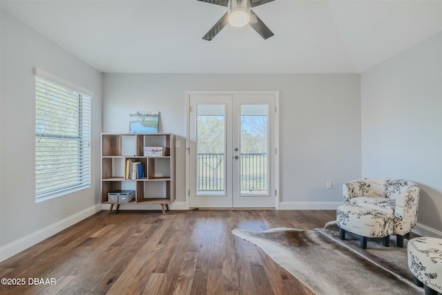 unfurnished room with ceiling fan, french doors, wood-type flooring, and a healthy amount of sunlight