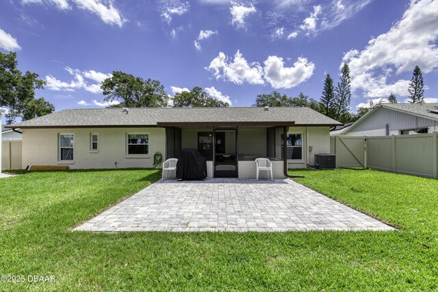 1408 Mollie Rd, Daytona Beach, FL 32114 - rear view of property featuring a patio, stucco siding, a sunroom, and a gate
