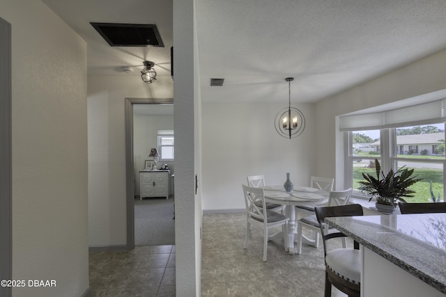 1408 Mollie Rd, Daytona Beach, FL 32114 - dining area with a chandelier and baseboards