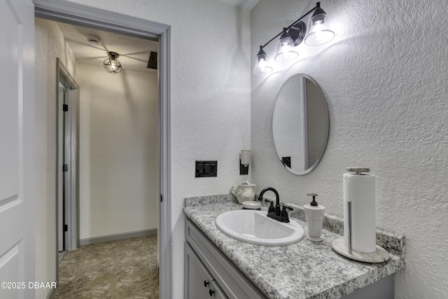 1408 Mollie Rd, Daytona Beach, FL 32114 - bathroom featuring vanity and a textured wall