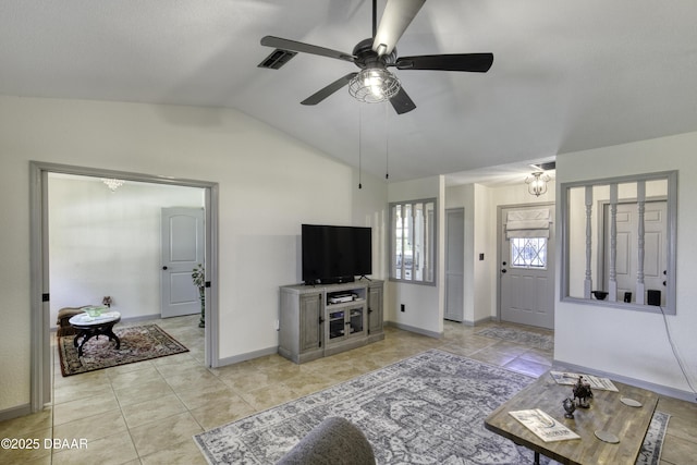 1408 Mollie Rd, Daytona Beach, FL 32114 - living area featuring vaulted ceiling, light tile patterned floors, and ceiling fan