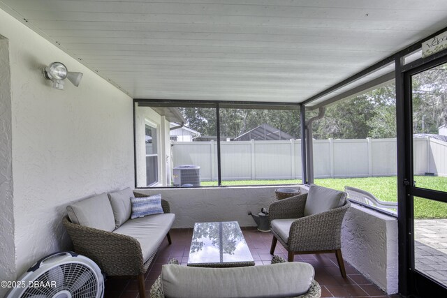 1408 Mollie Rd, Daytona Beach, FL 32114 - sunroom with healthy amount of natural light and an outdoor living space