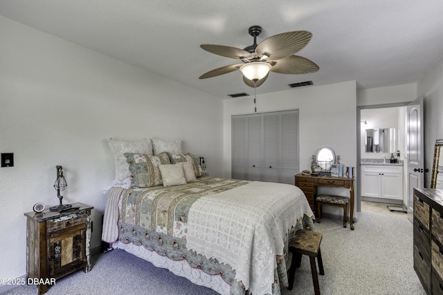 1408 Mollie Rd, Daytona Beach, FL 32114 - bedroom featuring light carpet, ceiling fan, and ensuite bathroom