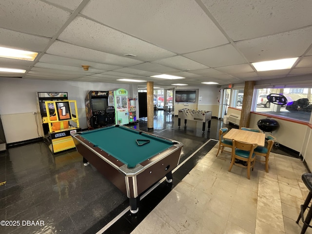 recreation room featuring tile patterned floors, a drop ceiling, and billiards